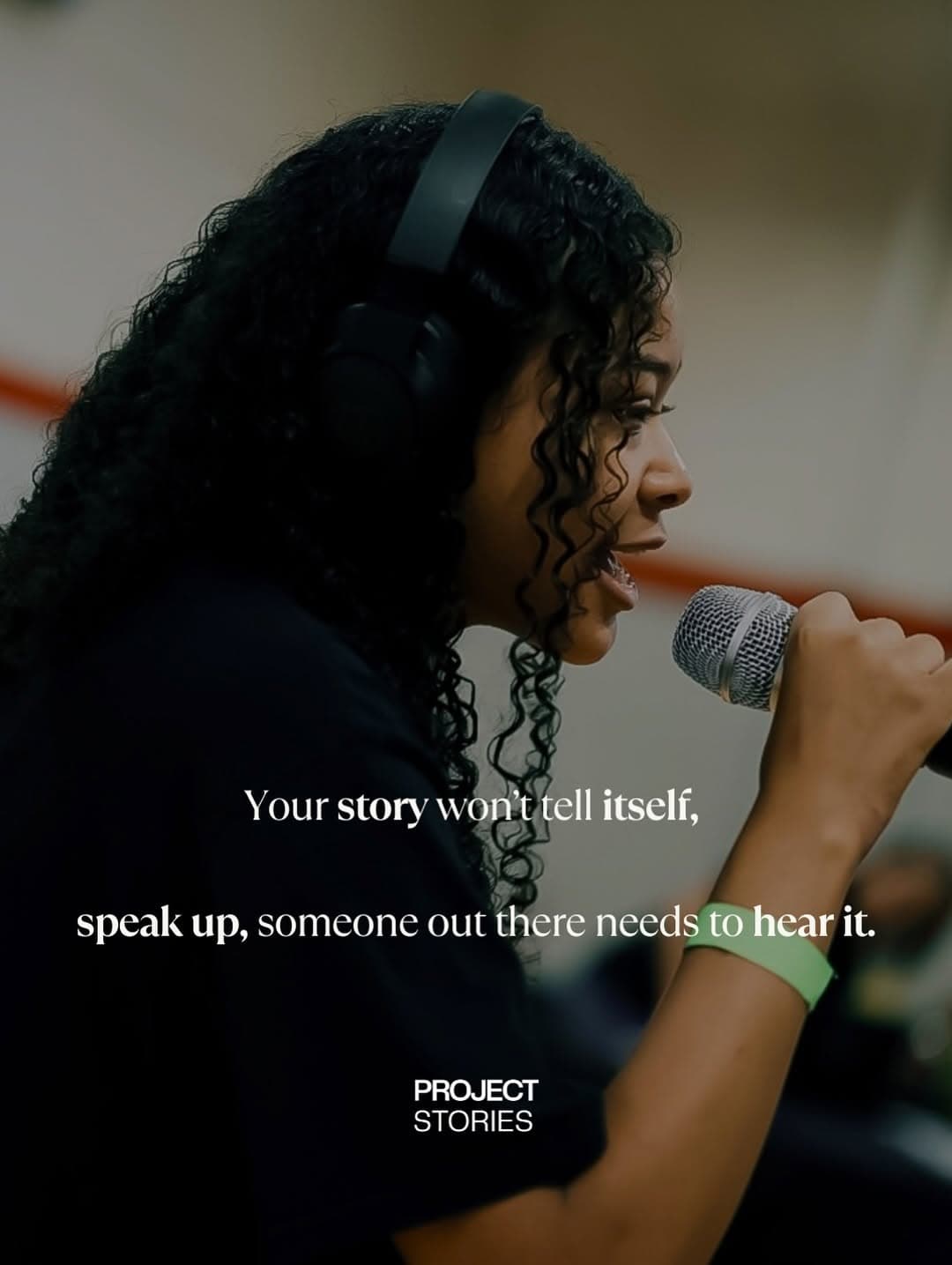 Speaker on stage with microphone